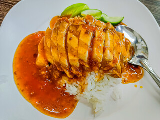 Crispy pork with rice and sauce, thai style.