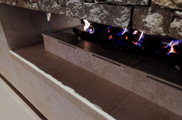 Modern Stone Fireplace with Dancing Flames