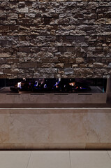 Rustic Stone Wall with Fireplace Below