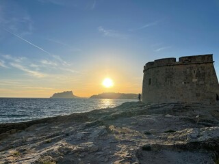 Sunset in Moraira, the day of the winter solstice, with magic light.