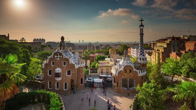 BARCELONA, SPAIN - NOVEMBER 9, 2024: Stunning sunset over Parc Guell, showcasing architectural beauty and vibrant surroundings in a scenic setting