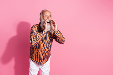 Photo of crazy shocked ols man hands near mouth shout yell loud empty space incredible ads isolated...