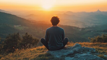 Obraz premium Sunset Meditation: Finding Peace Amidst the Mountains