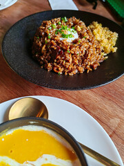 Fried rice, Pumpkin soup and various side dishes, korean food, lemon tea.