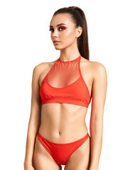 Fototapeta premium Bright red bikini with a sporty high-neck top featuring mesh panels and matching high-cut bottoms. The mesh detailing adds breathability,