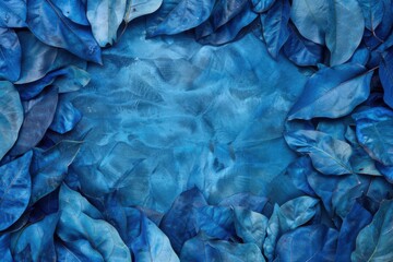 Fototapeta premium Blue-Hued Tropical Leaf Collection Against a Spacious Background