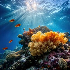 Obraz premium A dazzling array of soft coral in a range of vivid colors, accompanied by reef fish.