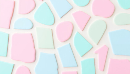 Abstract pastel irregular shapes on white textured background
