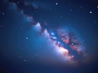 Naklejka premium Milky way galaxy shining through dark blue night sky