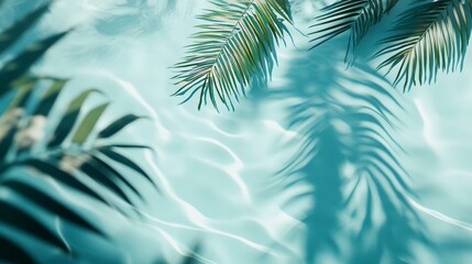 Top view of clear blue water with ripples and palm leaf shadows. A relaxing summer Zen background. 