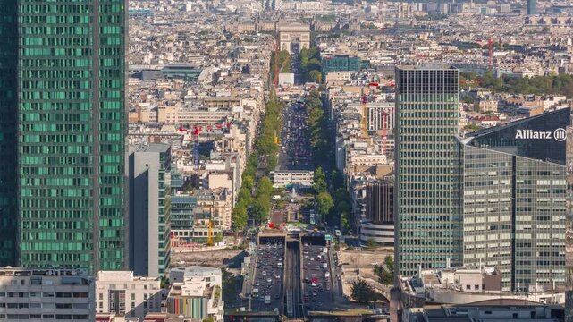 PARIS, FRANCE - OCTOBER 28, 2024: Aerial view of the bustling streets and iconic landmarks of Paris with traffic flowing along major avenues