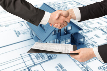 People shaking hand in a real estate transaction