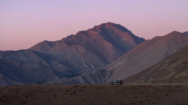Chile desert north sand dunes car passing by drone dusk morning parallax effect