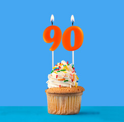 Orange birthday candle and cupcake - Number 90