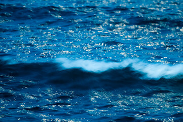 Waves with strong wind after a storm, abstract texture, Patagonia, Argentina.