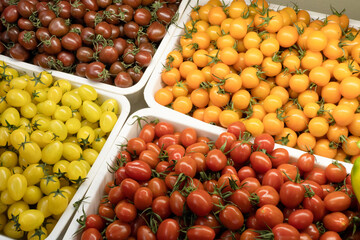 Close-up of cherry tomatoes in boxes at the market.