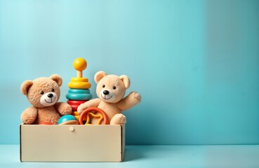 Light beige toy box filled with colourful baby toys. Cute teddy bears, wooden rattles, stacking pyramid inside. Collection of kids toys ready for donation. Playful colourful items on light blue