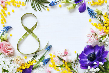 Floral spring background with number eight 8 from ribbon. Women's day greeting, copy space