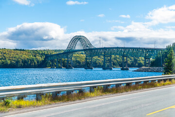 A view along the road approaching the Seal Island Bridge on the trans canada highway near Sydney,...