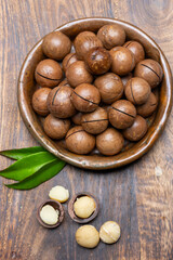 Australian Queensland macadamia nuts, or bush, maroochi, bauple nut, with sawn nutshell, fresh harvest