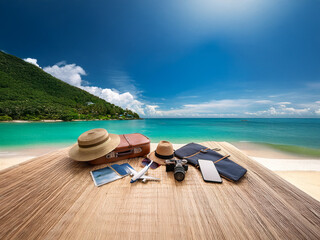 Tropical beach vacation essentials arranged on wooden surface: suitcase, hat, sunglasses, camera, phone, and travel documents.  Ready for adventure!