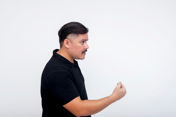 Man gesturing with determination isolated against a plain white background