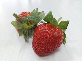 Fresh strawberry on the wooden table
