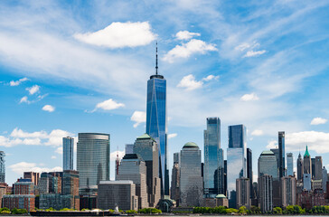 Fototapeta premium New York City with Manhattan Skyline over Hudson River,New York City, USA NYC, NY. New York City NYC Skyline with Urban Skyscrapers USA. Lower Manhattan and One World Trade Center in New York City