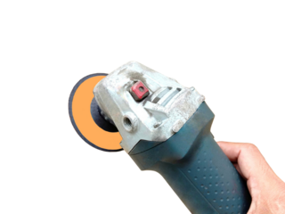 Electric grinding hardware tools in hand isolated on a transparent background.