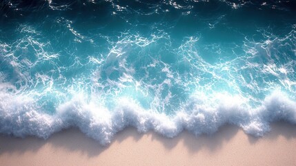 Fototapeta premium Ocean waves crashing on sandy beach.