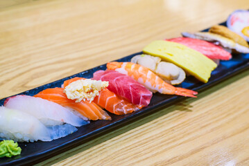 Assorted Fresh Nigiri Sushi on Long Black Plate