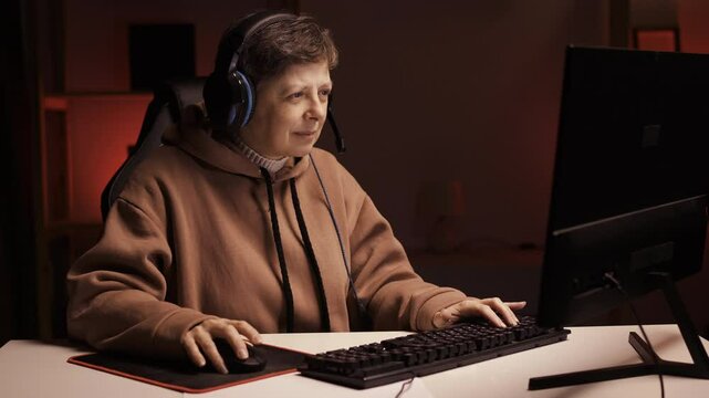 45s woman gaming at home. Female gamer playing in online videogame on PC. Professional streamer pro-gamer player clueless careless person tell do do not know with sorry expression
