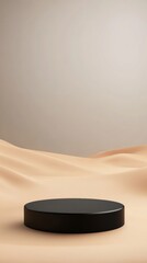 A minimalist black platform rests on smooth, beige fabric, creating a serene and elegant backdrop perfect for showcasing products or art.