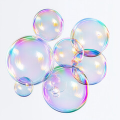  Several iridescent soap bubbles on a white background,