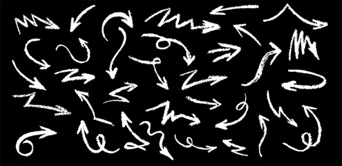 White crayon arrows set. Wax pencil drawing grafitti elements on black wall. Collection of vector charcoal outline symbols of direction indicators. Graffiti lightning icons Children drawing style.