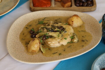 Chicken in Herb Sauce with Potatoes and Olives