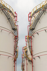 industrial chemical tank or oil or gas storage tank in a factory. industrial tank with clear sky background. photo with low angle object