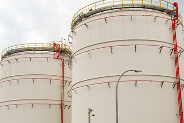 industrial chemical tank or oil or gas storage tank in a factory. industrial tank with clear sky background. photo with low angle object