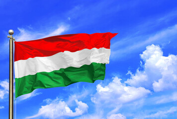 Flag of Hungary Waving Against a Clear Blue Sky