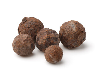 Group of old rusty iron balls
