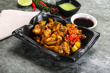 Vietnamese cuisine - fried frog with vegetables