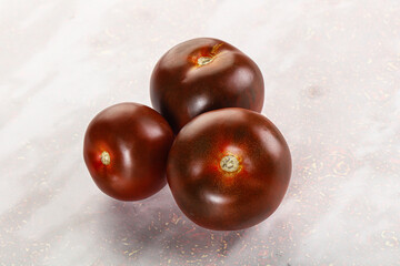 Organic natural juicy Kumato tomato