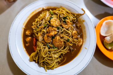 Mie Aceh, or Aceh noodles, a famous dish from Aceh, Sumatra Indonesia. Street food in Indoensia