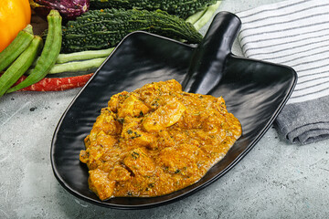 Spicy chicken masala in the bowl