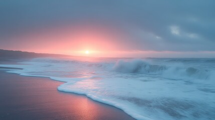 Dramatic sunset over ocean waves crashing on beach.