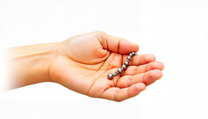 Open hand holding a silver rosary on white background