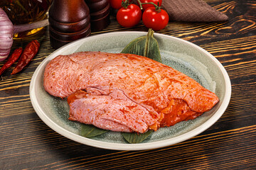 Raw marinated duck breast for cooking