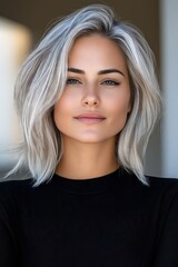 Fototapeta premium A woman with grey hair wearing a black top