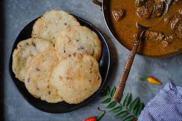 Ney Patha or Pathiri - Kerala Malabar breakfast served with Lamb curry