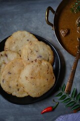 Ney Patha or Pathiri - Kerala Malabar breakfast served with Lamb curry
